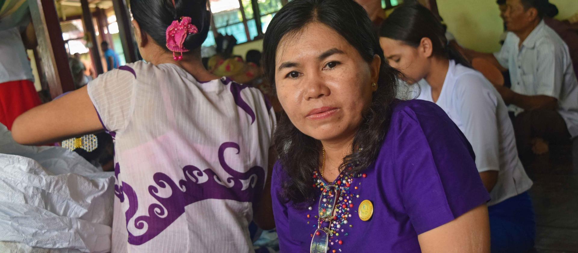 Daw Hla Hla Htay, Lab Technician Grade I, VBDC, Bago Region, at the LLIN mass distribution campaign, Pazunmyaung village. Photo: UNOPS