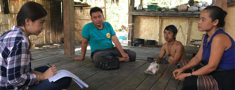 Dr Tin Me Me Aung, UNOPS RAI Officer in a meeting with villagers 