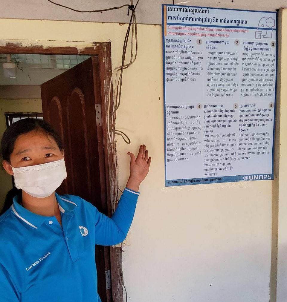 A Catholic Relief Services (CRS) staff member explains PSEA principles in the PSEA poster at the CRS office in Preah Vihear Province, Cambodia ©Catholic Relief Services 